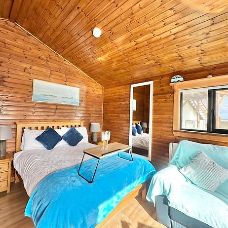 Cosy Portmor Log Cabin- Sea Views, Deck & Relaxation Malin Head Dış mekan fotoğraf